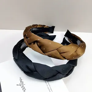 Serre-tête tressé en soie avec strass en noir et bronze pour un style élégant et chic