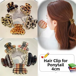 Detail view of 4cm leopard and plaid small hair claw clips for back head hair styling