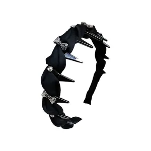 Fashionable black twisted headband with silver rhinestones and integrated hair comb teeth