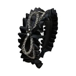 Elegant wide black pleated headband with sparkling rhinestone bow and crystal drop accent