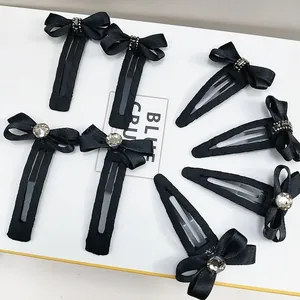 Elegantes 8-teiliges schwarzes Schleifen-Haarclip-Set mit Strasssteinen und BB-Snaps