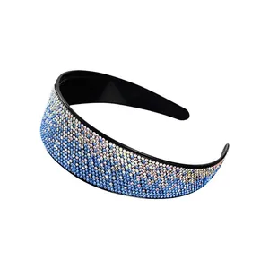 Sparkling rhinestone headband for women featuring blue gradient crystals and anti-slip teeth