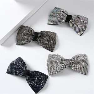 Sparkling rhinestone bow hair clips in four colors including silver, blue and grey