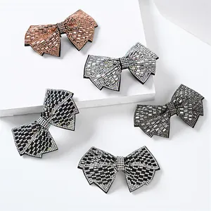 Elegant rhinestone-encrusted bow hair clips in multiple colors for a stylish look