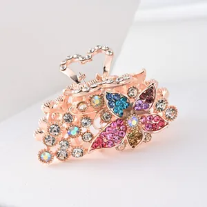 Sparkling rhinestone butterfly hair claw clip with colorful stones in rose gold finish