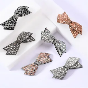 Double-layered crystal bow hair clip collection in five colors on display stands