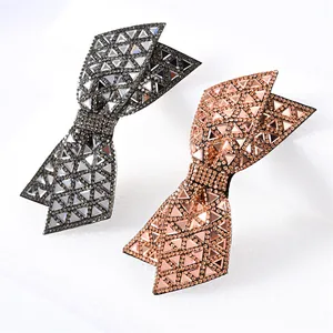 Sparkling double layered bow hair clip set with rhinestones in black and rose gold finish