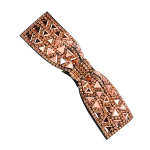 Barrette à cheveux nœud en strass avec cristaux or rose et design géométrique compact