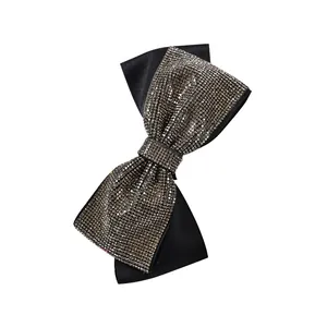 Sparkling rhinestone bow hair clip with black satin fabric and spring fastener
