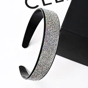 Detail of French vintage rhinestone headband with non-slip teeth and colorful crystals