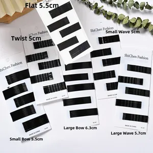 Lot de barrettes à cheveux en métal noir avec divers modèles plats et ondulés sur carte