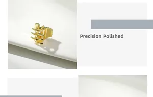 Detail van een nauwkeurig gepolijste gouden metalen mini haarklem met glanzende afwerking