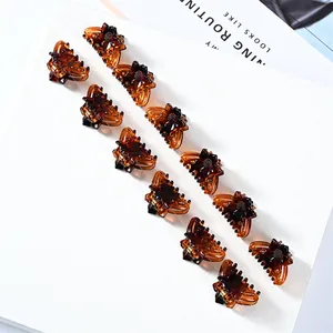 Mini amber resin butterfly hair clips in elegant geometric floral design for women