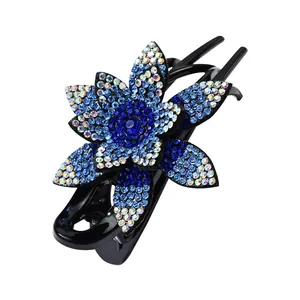 Pinza para el pelo con flor de cristales azules brillantes para peinados elegantes