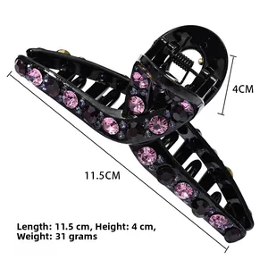 Detalle de la pinza para el pelo de 11,5 cm con diamantes rosas y morados