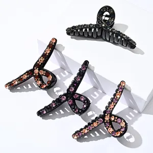 Elegantes pinzas grandes para el pelo con pedrería en cuatro colores sobre base