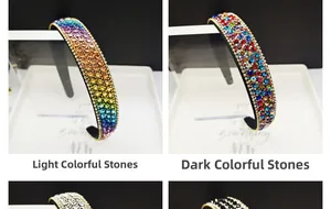 Detail of four colorful rhinestone headbands in light rainbow, deep rainbow, silver and black