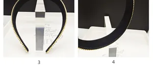 Close-up detail of wide headband with dense sparkling rhinestones and black non-slip lining