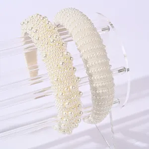 Set van twee witte parel haardbanden met retro gewatteerd design voor extra volume in haar