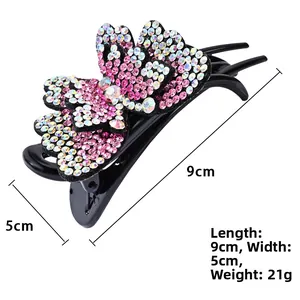 Detail view of crystal butterfly hair clip showing 9cm length and 5cm width dimensions