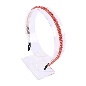 Elegant red crystal beaded headband for women with non-slip design on a display stand