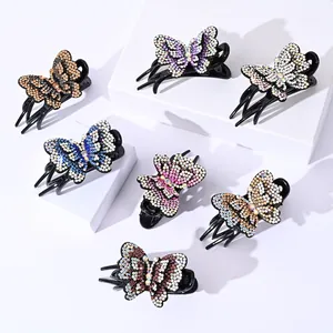 Set of seven sparkling double-layered butterfly hair claws with colorful rhinestones