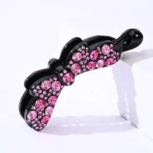 Fermaglio a banana con fiocco in strass rosa scintillanti per acconciature