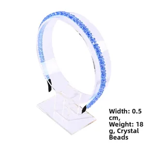 Detailed view of 0.5cm slim blue crystal beaded headband weighing 18g on white display