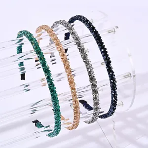 Elegantes diademas con cuentas de cristal en cuatro colores en soporte acrílico