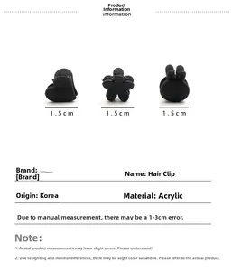 Detalle de mini pinzas para el cabello negro mate de 1,5 cm con forma de corazón