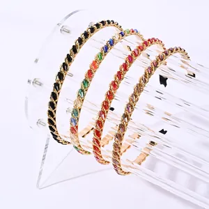 Serre-têtes élégants en cristal quatre couleurs sur supports acryliques et cadres dorés
