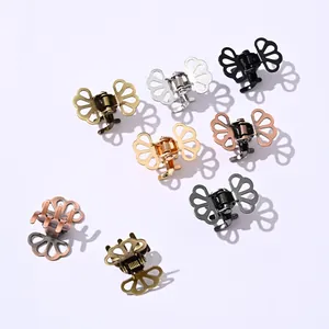 Vintage butterfly hollow metal mini hair claws set in multiple metallic colors on white