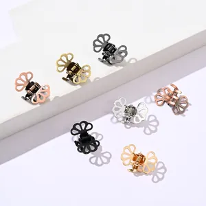 Minimalist hollow metal mini hair clips in various metallic finishes on a white background