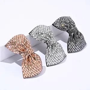 Bow crystal hair clip set in rose gold, silver, and grey with sparkling rhinestones