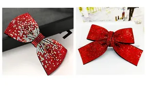 Détail de la barrette à nœud en strass rouges avec cristaux brillants et pince à ressort