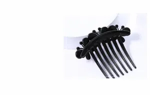 Close-up of elegant black floral rhinestone hair comb with seven teeth for women's updos
