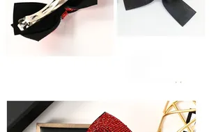 Détail d'une pince à cheveux nœud rouge avec strass et attache en métal argenté