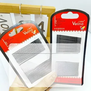Detail of black wave hair clips set on branding card with high-quality steel finish