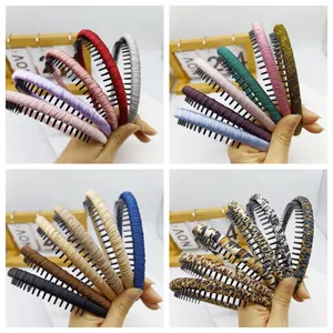 Diademas de tela con dientes en colores lisos y estampados de leopardo moda