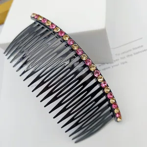 Sparkling rhinestone hair comb with pink and champagne yellow crystals on black base
