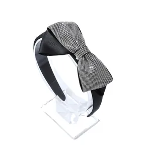 Sparkling rhinestone bow headband in black satin fabric for elegant women accessories