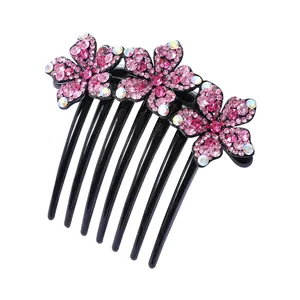 Elegante haarkam met zeven tanden, roze strass-steentjes en zwarte harsbasis