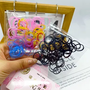 Durable high-elasticity colorful disposable hair bands set in transparent packaging