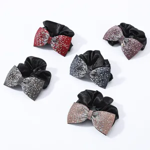 Set di cinque elastici per capelli di lusso con fiocchi di strass in vari colori