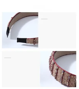 Detailed macro of crystal beads and red gemstones on a French luxury padded headband