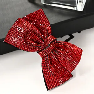 Elegant red bow hair clip with full rhinestone inlay and shimmering crystal finish