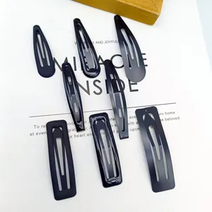 Ensemble de barrettes à cheveux en métal noir mat aux diverses formes géométriques