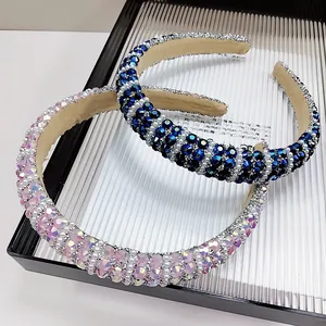 Detail of handmade padded headband featuring navy blue rhinestones and elegant pearls