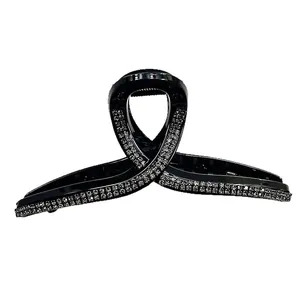 Elegant black rhinestone hair claw clip with twisted ribbon design for formal occasions