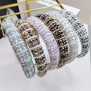 Macro display of heavy sponge headbands with sparkling rhinestones and pearls in six colors